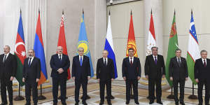 Leaders of ex-Soviet nations members of the Commonwealth of Independent States,from left,Azerbaijan’s Ilham Aliev,Armenia’s Nikol Pashinyan,Belarus’ Alexander Lukashenko,Kazakhstan’s Kassym-Jomart Tokayev,Russia’s Vladimir Putin,Kyrgyzstan’s Sadyr Zhaparov,Tajikistan’s Emomali Rakhmon,Turkmenistan’s Gurbanguli Berdymukhamedov,and Uzbekistan’s Shavkat Mirziyoyev,meet in Strelna,Russia,on December 28.