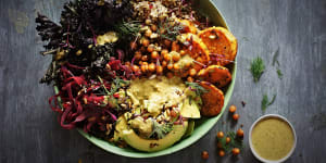 Sweet potato and kale bowl with quinoa,coriander tahini dressing and crispy chilli-lime chickpeas.