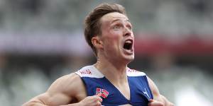 Norway’s Karsten Warholm reacts after beating his own world record mark.