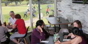 Clubby:Prime windowside tables overlooking the 10th tee.