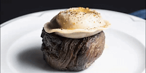 Bistecca al pepe - eye fillet steak topped with a pepper sauce-filled raviolo - at Gambino restaurant in Glen Waverley.