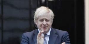 Prime Minister Boris Johnson takes part in the weekly'Clap for Carers'outside Downing Street.