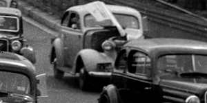Hive of activity:a traffic jam on the bridge in 1946.