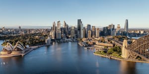 Lendlease’s One Circular Quay,the silver site to the right,reaches $1b sales as construction powers ahead.