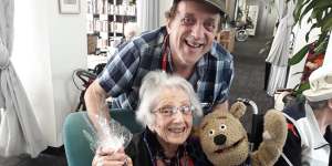 Abe Schwarz with his mum Tess at her aged care facility.