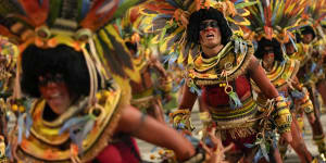 Performers from the Salgueiro samba school parade during Carnival celebrations at the Sambadrome in Rio de Janeiro.
