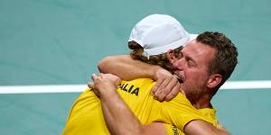 Purcell and Lleyton Hewitt embrace after last year’s Davis Cup semi-final victory.