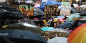 Climate change protesters marched through Melbourne,in defiance of a police request to postpone the rally. 