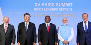 Brazil’s President Luiz Inacio Lula da Silva,China’s President Xi Jinping,South Africa’s President Cyril Ramaphosa,India’s Prime Minister Narendra Modi and Russia’s Foreign Minister Sergei Lavrov pose during BRICS summit in Johannesburg,on August 22.