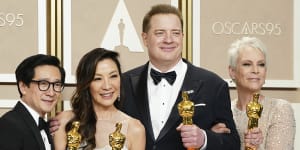 Ke Huy Quan and Michelle Yeoh backstage at the Oscars.