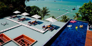 Take breakfast by the pool overlooking the ocean at Sri Panwa resort.