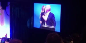Jennifer Hawkins appears to turn her cheek as Donald Trump goes to kiss her.