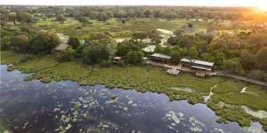 Vumbura Plains camp:Wildlife freely come and go from this lagoon.