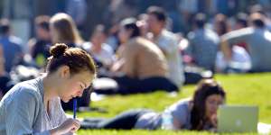 The University of Melbourne reported an $8 million surplus,despite a 22 per cent decline in international student enrolments.
