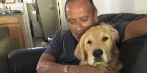 Franklin Trejos with his golden retriever Sam. Trejos died in the Lahaina wildfires while using his body to shield Sam in the back of his car.