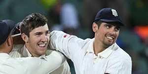 Milestone moment:Teammates congratulate debutant Craig Overton.