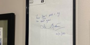 The framed letter from ABC chair Ita Buttrose to Leigh Sales asking her not to park in her car space,now sits above Sales’ desk.