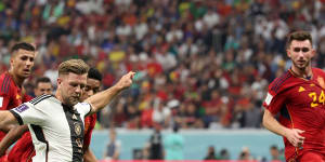 Germany grab point in Spain showdown,cling to World Cup spot