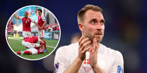 Danish players run to Christian Eriksen’s aid (inset). Eriksen is back playing at the World Cup.