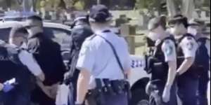Four people were arrested at Rookwood Cemetery on Wednesday.