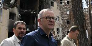 Australian Prime Minister Anthony Albanese tours damaged residential areas in Irpin on the outskirts of Kyiv,Ukraine,Sunday,July 3,2022. 
