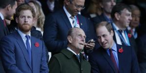 Prince Harry,Prince Philip and Prince William at a rugby match in 2015. 