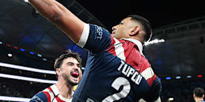 Daniel Tupou celebrates a try against Parramatta. 