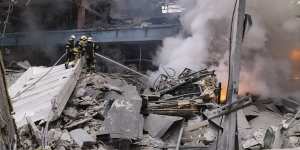 Firefighters work to extinguish a fire after a Russian attack in Kharkiv,Ukraine,last week.