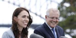 Prime Minister Scott Morrison with New Zealand counterpart Jacinda Ardern. Citizens of both countries highly rate their governments'reactions to the pandemic.