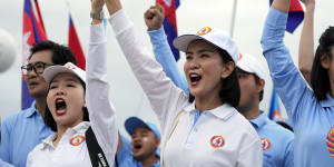 Cambodian People’s Party backers take to the streets of the capital on Friday.