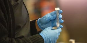 A test swab at a COVID-19 variant testing site inside the airport in Los Angeles.