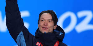Gold medallist Nils van der Poel of Team Sweden poses with his gold medal at the Winter Olympic Games in Beijing.