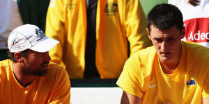 Bernard Tomic and Pat Rafter of Australia at a Davis Cup tie against Germany in 2012.
