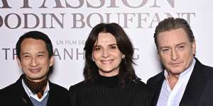 Tran Anh Hung,Juliette Binoche and Benoit Magimel at the Paris premiere of The Taste of Things.