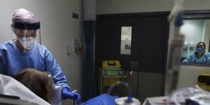 Nurse Talyna Smith in an isolation room at St Vincent’s Hospital emergency department’s red zone.