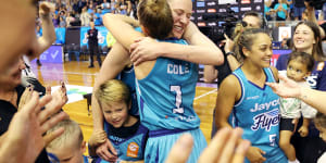 Lauren Jackson celebrates with Rebecca Cole after the Southside Flyers clinched victory on Sunday.