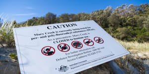A sign warning of PFAS testing at Wreck Bay.