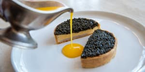 Caviar and scallop mousseline pie with citrus butter.
