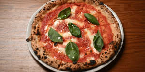 Lovely leopard spots dot the crust on the margherita pizza at Figlia.