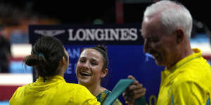 Godwin (left) embraces countrywoman and fellow Birmingham gold medallist Kate McDonald.