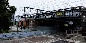 Macdonaldtown is the station without a suburb:the ABS website has it in Eveleigh but on the border of Erskineville and Newtown. 