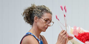 Everbloome’s Tracey McPherson prepares flowers for Valentine’s Day.