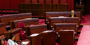 Senator Fatima Payman sits alone in the Senate on Thursday.