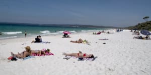 A tale of two summers for beach loved to death,then deserted