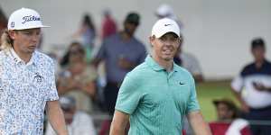 Cameron Smith and Rory McIlroy striding the fairways together.