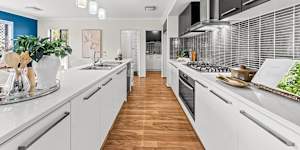The tidy five-bedroom,three-bathroom house at 5 Torville Road sits on a 520-square-metre block in one of the suburb’s top pockets.