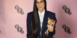 Demi Moore,with micro chihuahua Pilaf,nails the barrel-leg and cinched-blazer combo.