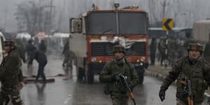 Kashmir car bomb kills dozens;India demands action on militants