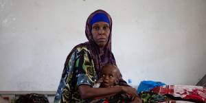 Farhan Apti is nursed by his grandmother Arfi Jama at Burao General Hospital in Somaliland. The 17-month-old is being treated for malnutrition.