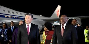 Chinese President Xi Jinping meets South African President Cyril Ramaphosa ahead of the summit at Tambo International Airport in Johannesburg.